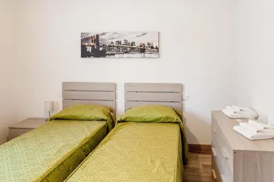 Letto o letti in una camera di Appartamento Le Barche