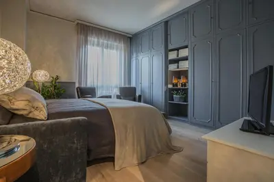 Letto o letti in una camera di Spazio Duomo1 by Welc(H)ome