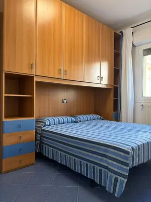 Letto o letti in una camera di App4rent - VILLA MIMOSA - 3 Family apartments - parking, wifi, near the beach