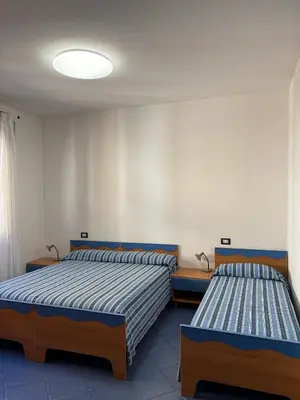 Letto o letti in una camera di App4rent - VILLA MIMOSA - 3 Family apartments - parking, wifi, near the beach