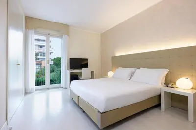 Letto o letti in una camera di Hotel Gallia & Resort