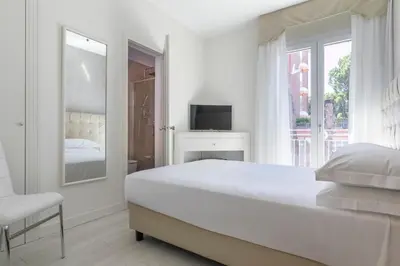 Letto o letti in una camera di Hotel Gallia & Resort