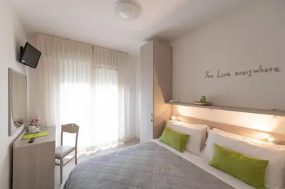 Letto o letti in una camera di Hotel Anny