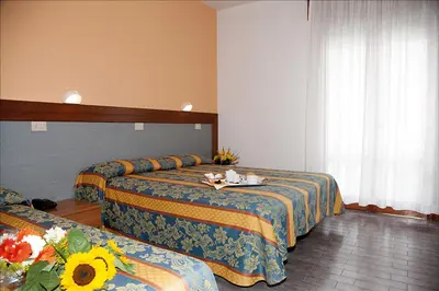 Letto o letti in una camera di Hotel Bettina