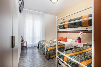 Letto o letti in una camera di Hotel Bettina