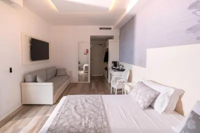 Letto o letti in una camera di Park Hotel Cellini