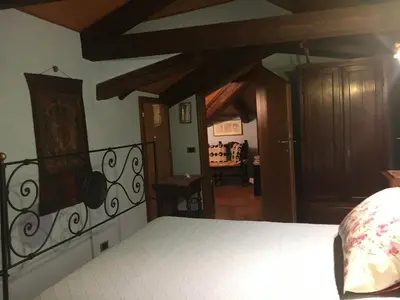 Letto o letti in una camera di Suite Attico con Altana