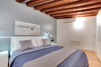 Letto o letti in una camera di San Marco - Campo Manin by Wonderful Italy