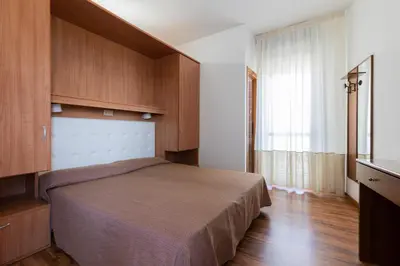 Letto o letti in una camera di Hotel President