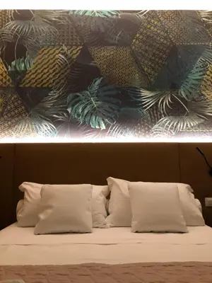 Letto o letti in una camera di Hotel Suez