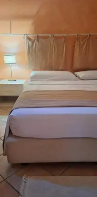 Letto o letti in una camera di Hotel La Selce