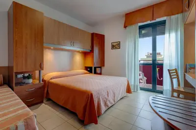 Letto o letti in una camera di Hotel Jalisco