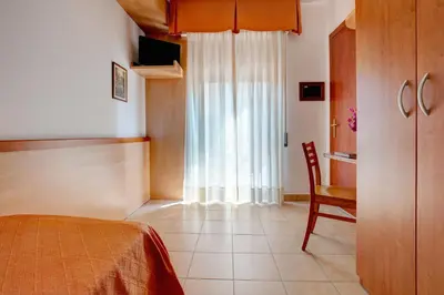 Letto o letti in una camera di Hotel Jalisco