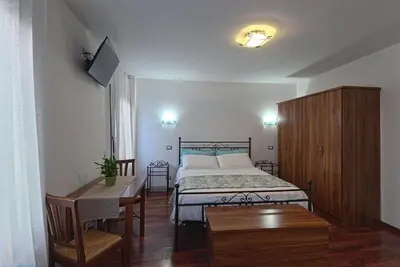 Letto o letti in una camera di B&B Sognare A Venezia