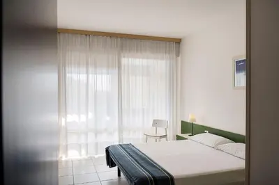 Letto o letti in una camera di Isaresidence Holiday Resort
