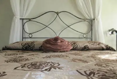 Letto o letti in una camera di Agriturismo Antiche Mura