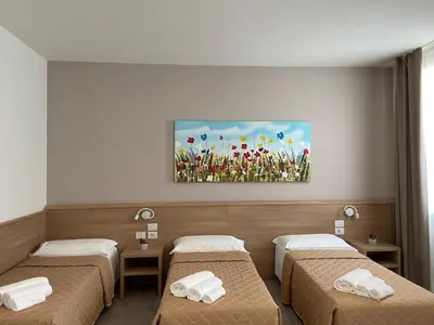 Letto o letti in una camera di Locanda Damaro