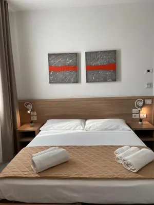 Letto o letti in una camera di Locanda Damaro