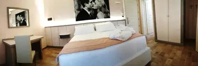Letto o letti in una camera di Hotel Locanda Dolce Vita