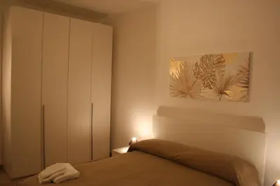 Letto o letti in una camera di Casa Palladio