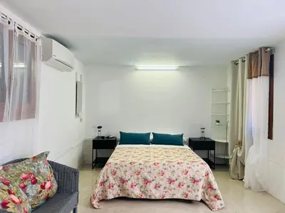Letto o letti in una camera di Santo Stefano Apartment