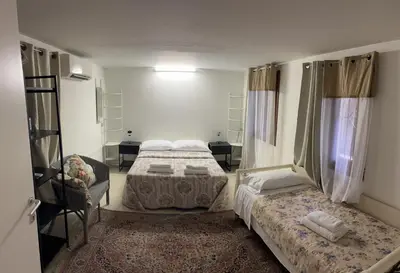 Letto o letti in una camera di Santo Stefano Apartment