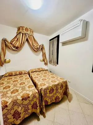 Letto o letti in una camera di Santo Stefano Apartment