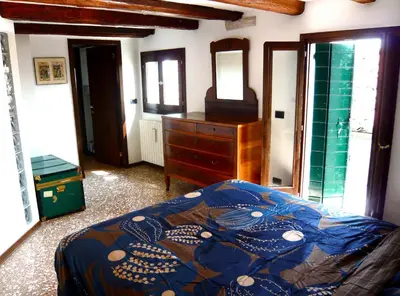 Letto o letti in una camera di Finestra su Venezia