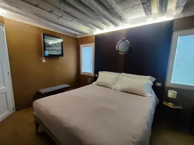 Letto o letti in una camera di Casa Sansera