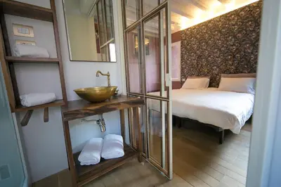 Letto o letti in una camera di Casa Sansera