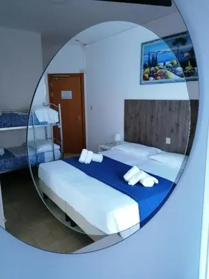 Letto o letti in una camera di Hotel Danieli
