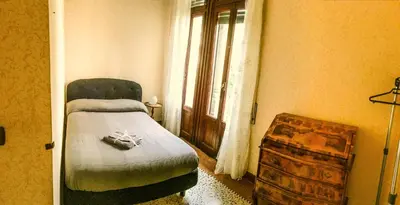 Letto o letti in una camera di Villa Corrado