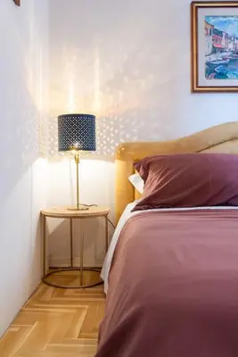 Letto o letti in una camera di Ca' sull' Acqua