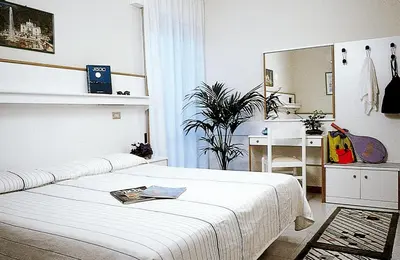 Letto o letti in una camera di Hotel Nelson