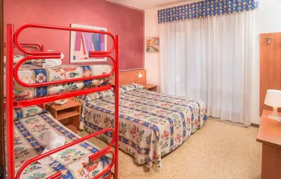 Letto o letti in una camera di Hotel Antille e Azzorre