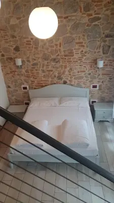 Letto o letti in una camera di Residenza Tito Livio Teolo
