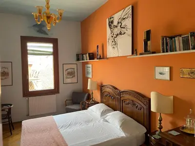 Letto o letti in una camera di B&B S.Marco