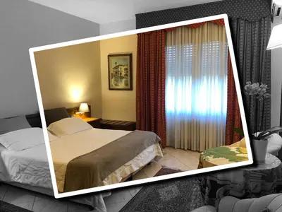 Letto o letti in una camera di B&B Casa Boscolo
