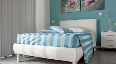 Letto o letti in una camera di Ca' Belvedere
