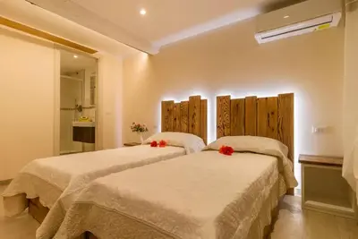 Letto o letti in una camera di Veneziacentopercento Apartments & Rooms