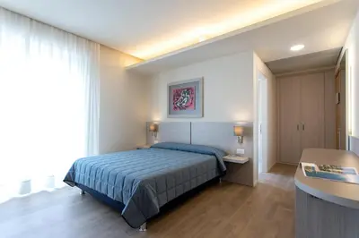 Letto o letti in una camera di Hotel Ancora