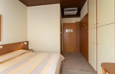Letto o letti in una camera di Hotel Ancora