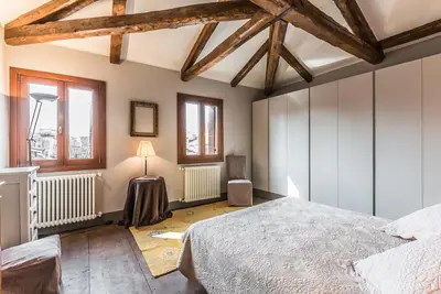 Letto o letti in una camera di Ca' Del Pittore Terrace