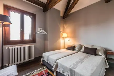 Letto o letti in una camera di Ca' Del Pittore Terrace