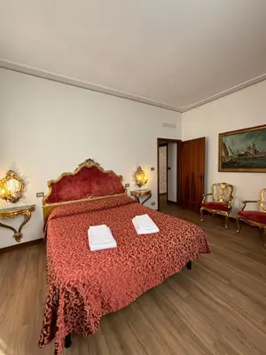 Letto o letti in una camera di Ca Barbaro with altana-appartamenti storici-