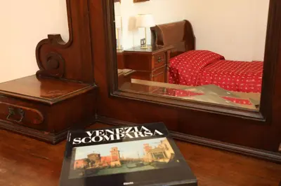 Letto o letti in una camera di Ca Barbaro with altana-appartamenti storici-
