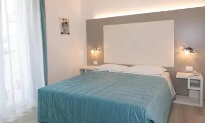 Letto o letti in una camera di Hotel & Aparthotel Carinthia S