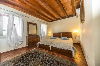 Letto o letti in una camera di Ca' Noemi