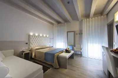 Letto o letti in una camera di Hotel Hollywood***S