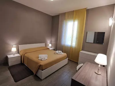 Letto o letti in una camera di Casa Belfiore Vicenza Martiri di Belfiore 23